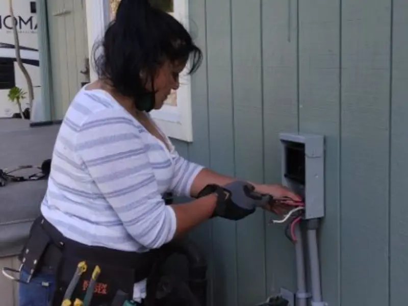 Licensed electrician wiring an exterior subpanel in Lower Makefield