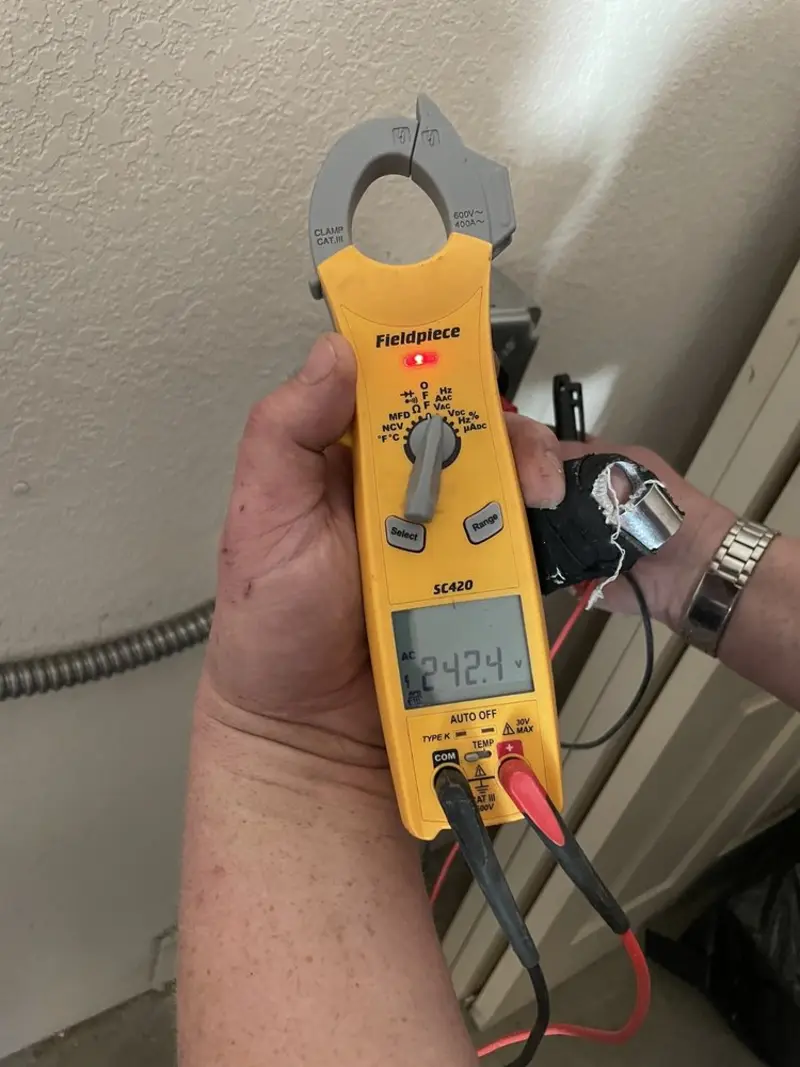 Voltage testing with clamp meter during Electrical Installation Services in Lower Makefield